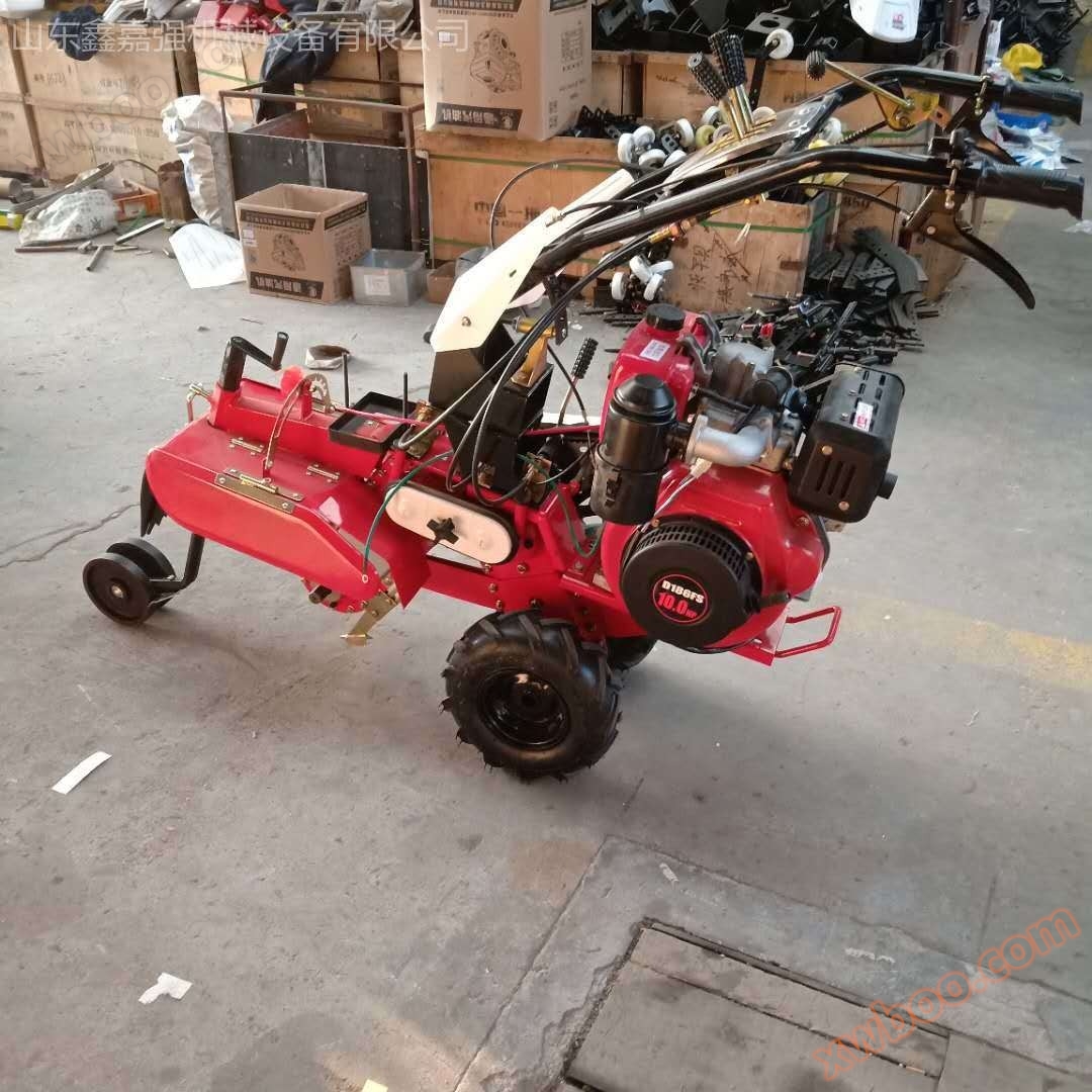 New multifunctional micro tiller gasoline four-wheel drive micro tiller Xinjiaqiang direct sales land reclamation weeding and loosening machine