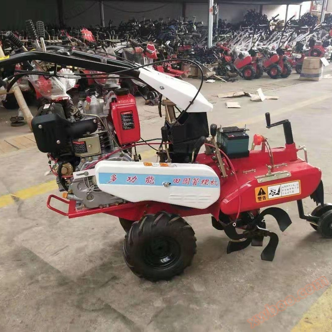 Diesel four-wheel drive micro tiller, trenching rotary tiller, Xinjiaqiang direct sales lightweight orchard greenhouse soil loosening and weeding machine