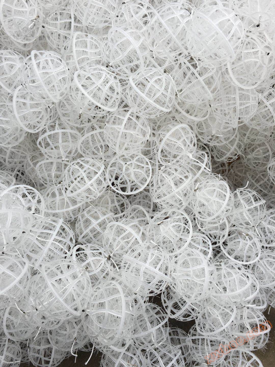 Suspended ball packing material